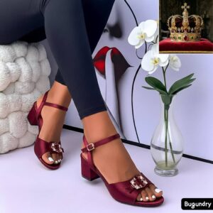 Mid Block Heel Sandals with a Rhinestone-Embellished Buckle.
